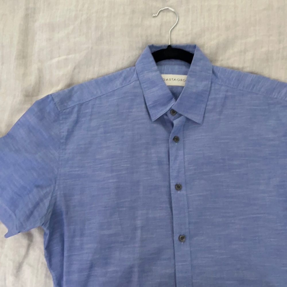 Blue short sleeved shirt. Excellent condition.